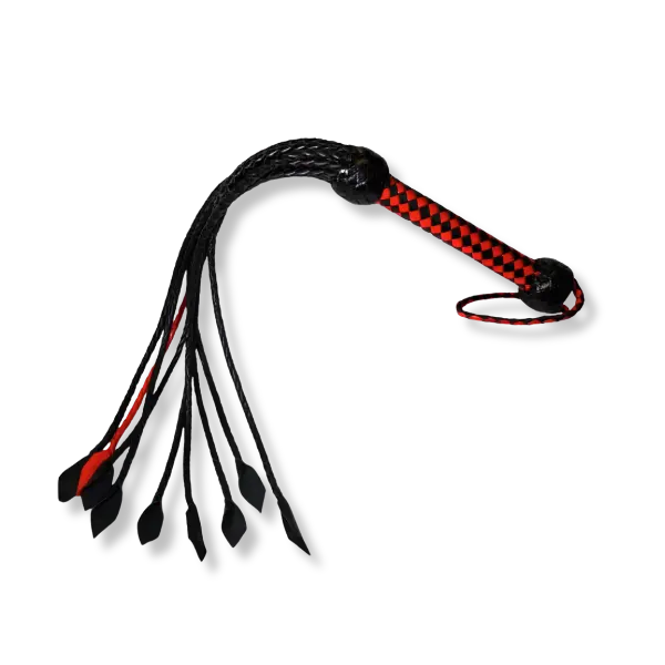 a black leather whip with black and red braided handle and hand strap, on white background