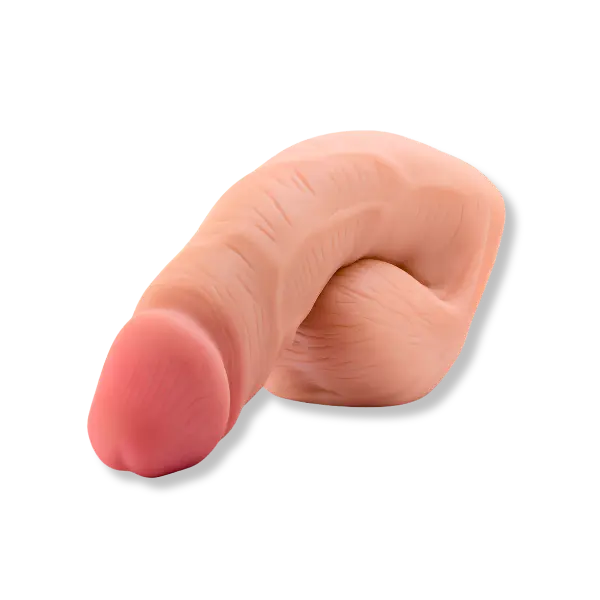 a silicone realistic replica of a penis designed to fit into packing underwear to enhance bulges, on a white background